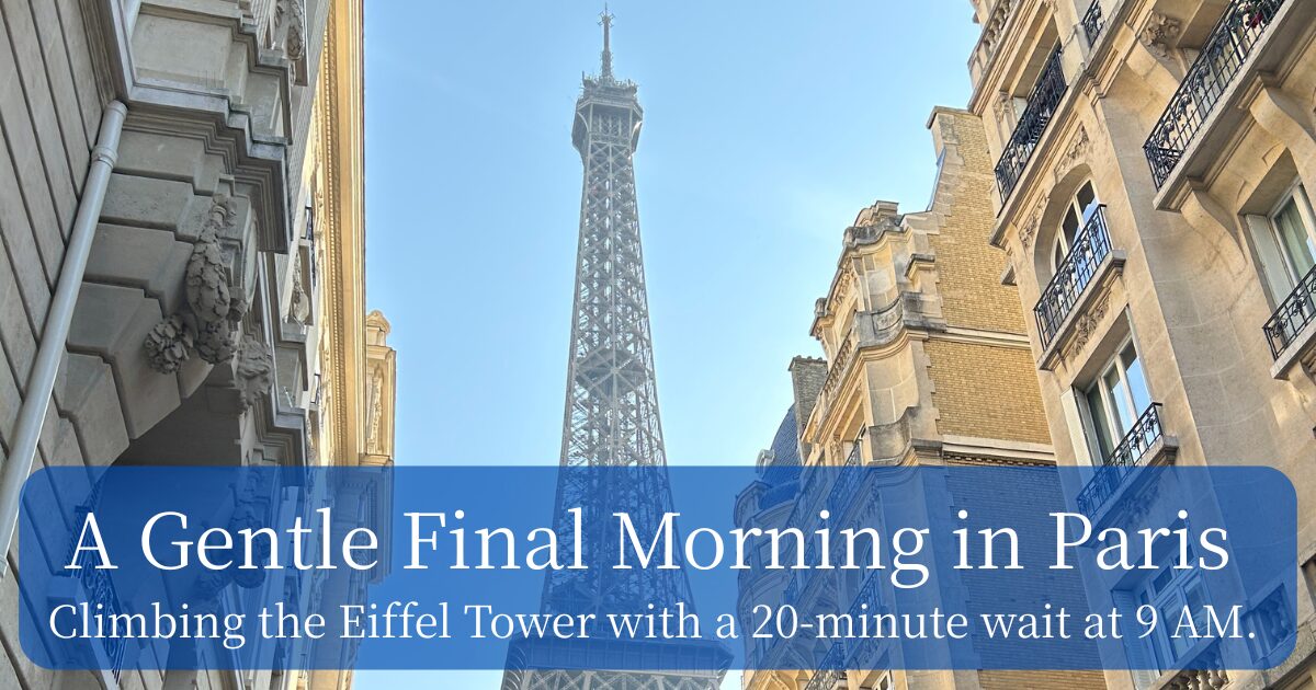 Eiffel Tower viewed from the street on a clear morning in Paris
