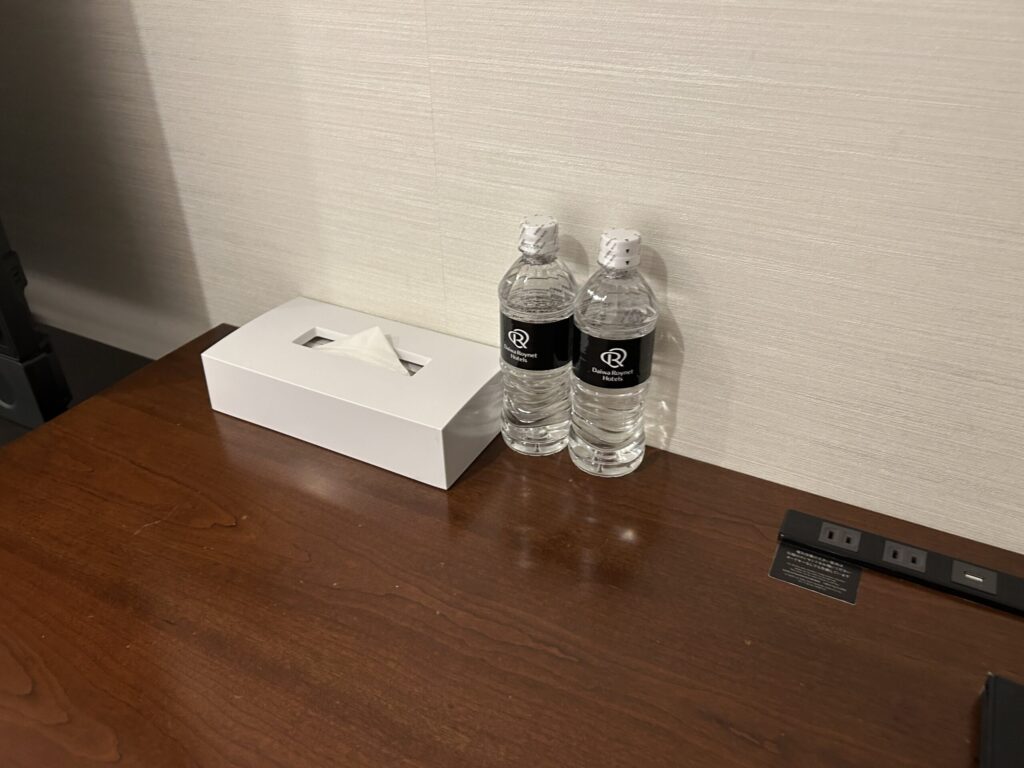 Complimentary mineral water bottles provided in the guest room at Daiwa Roynet Hotel Nishi-Shinjuku PREMIER