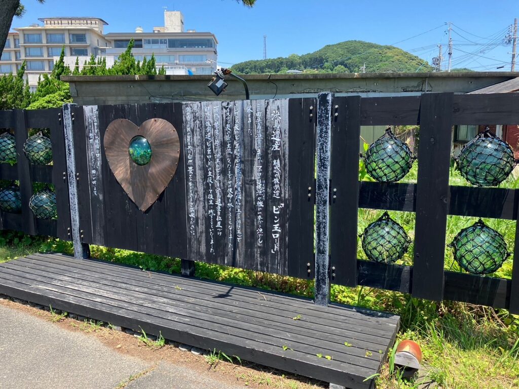 Glass fishing floats displayed along Bindama Road in Hamajima