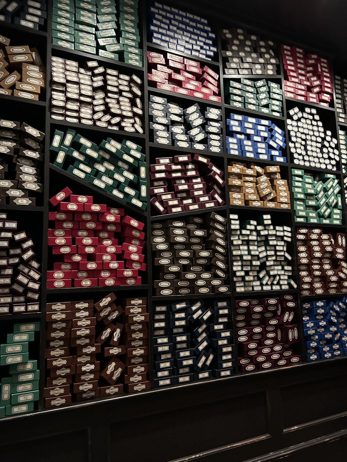 Rows of character wand boxes displayed at Warner Bros. Studio Tour Tokyo