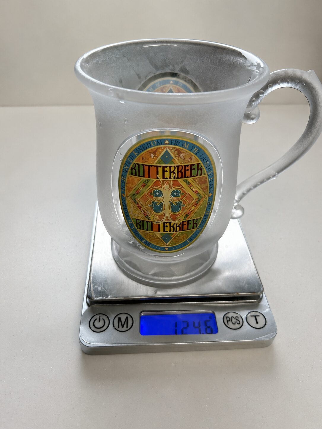 Empty Studio Tour Tokyo Butterbeer souvenir cup weighing 124.6 grams
